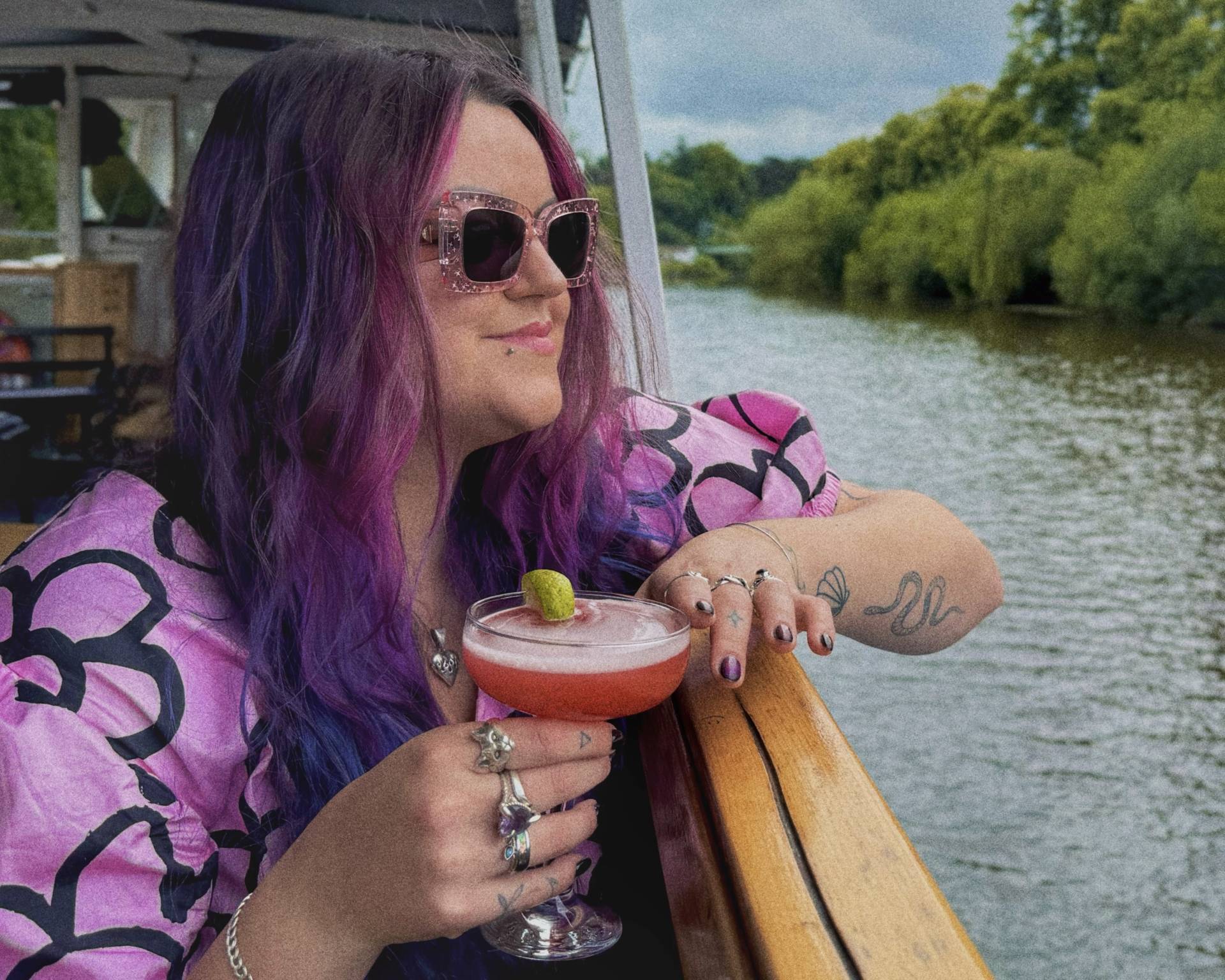 Luisa looks out over the side of a Sabrina Boat River Severn Shrewsbury Shropshire